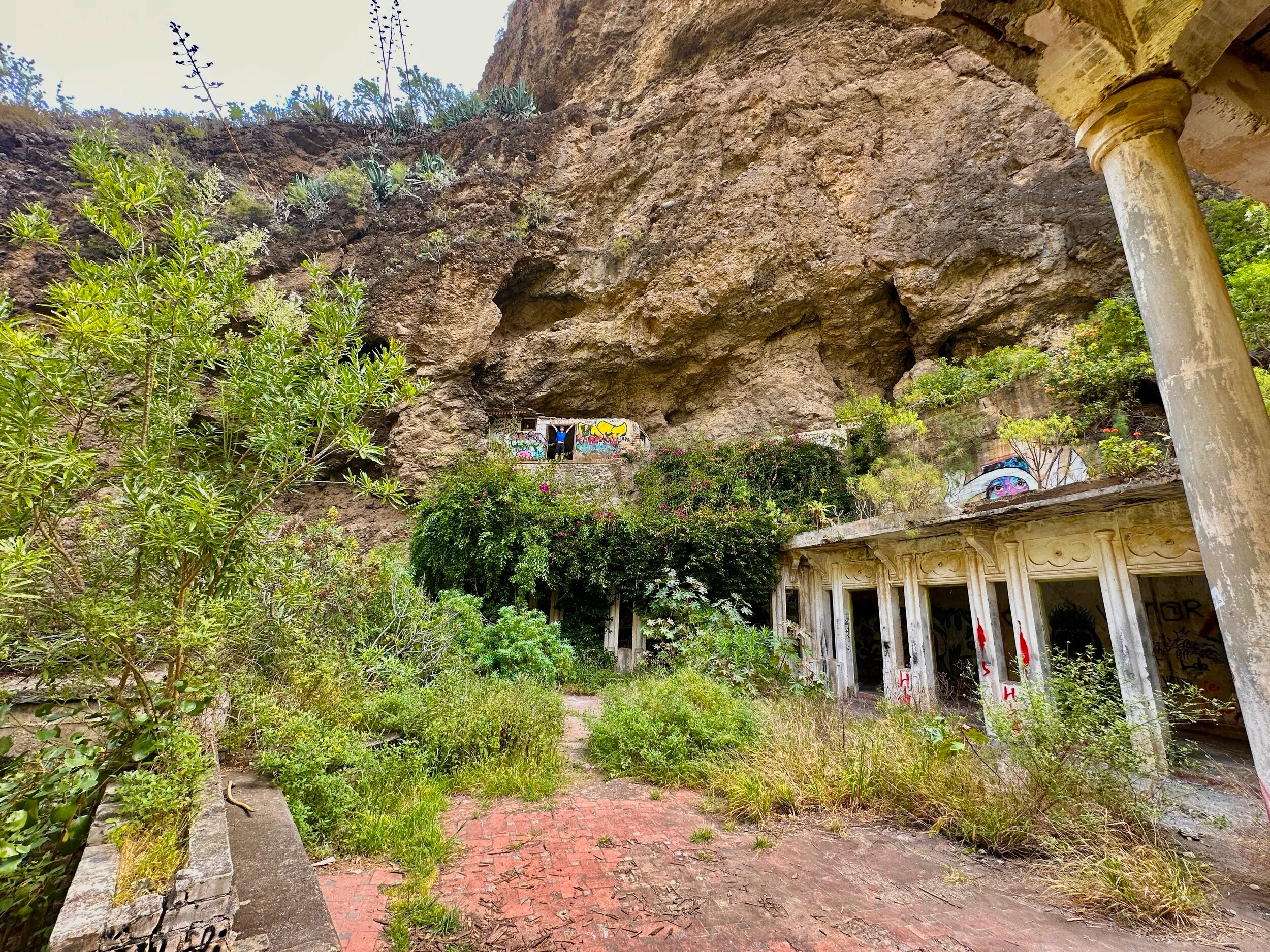 A thermal spa hotel in a Canarian ravine, built on waters people had come to for centuries, abandoned and slowly returning to the gorge.